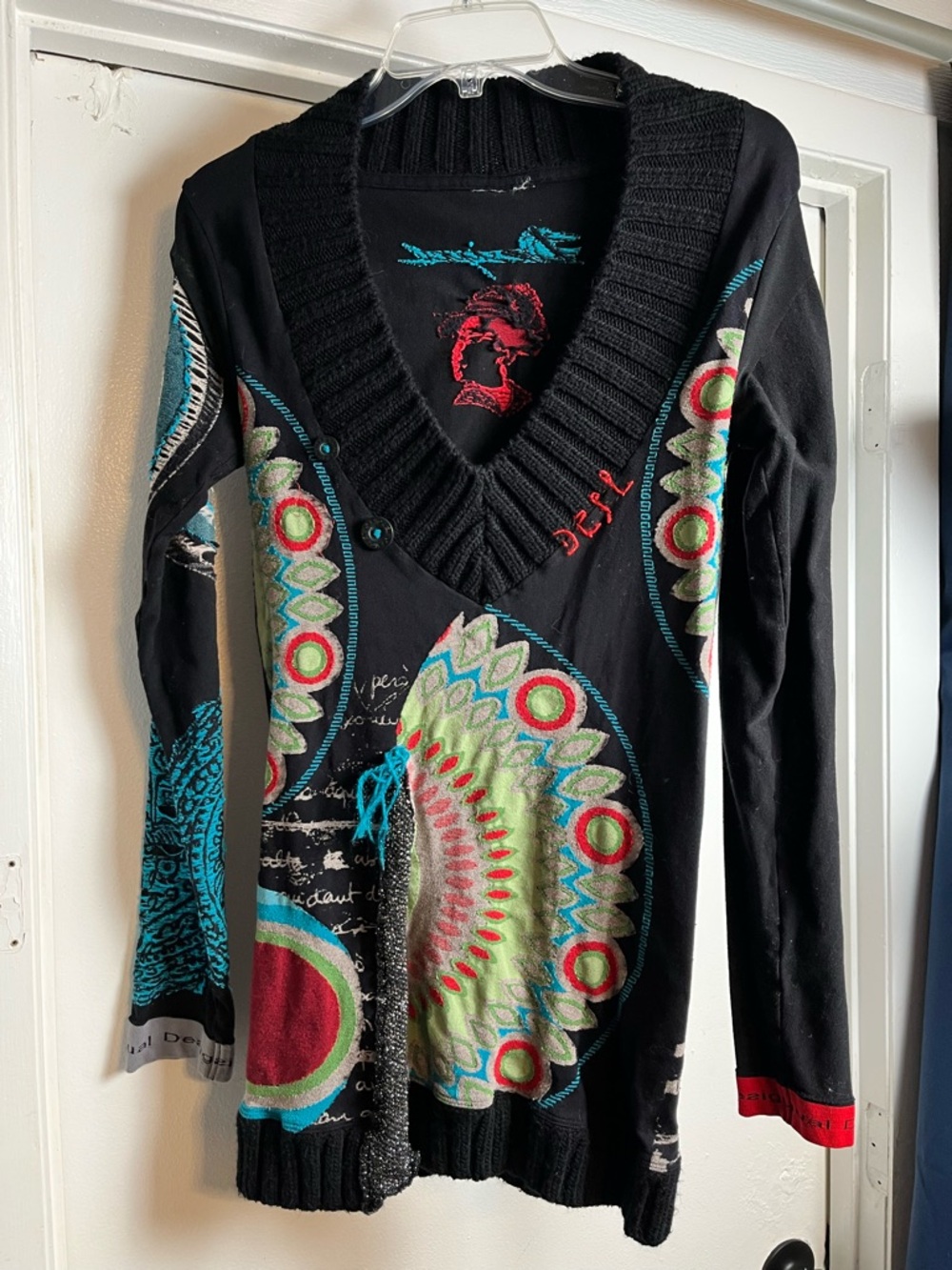 Black V-Neck Women's Sweater with Multicolor Medallion Accents